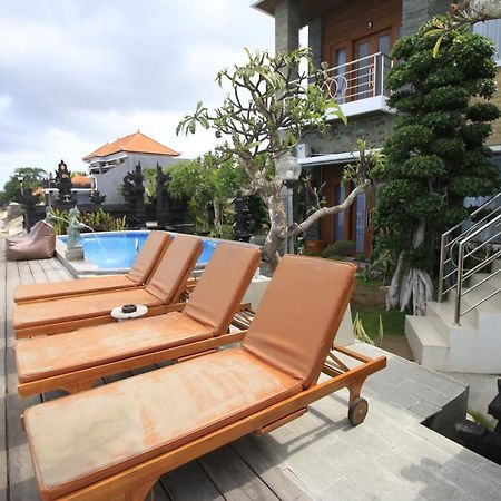 Green Beach Inn Batununggul Luaran gambar