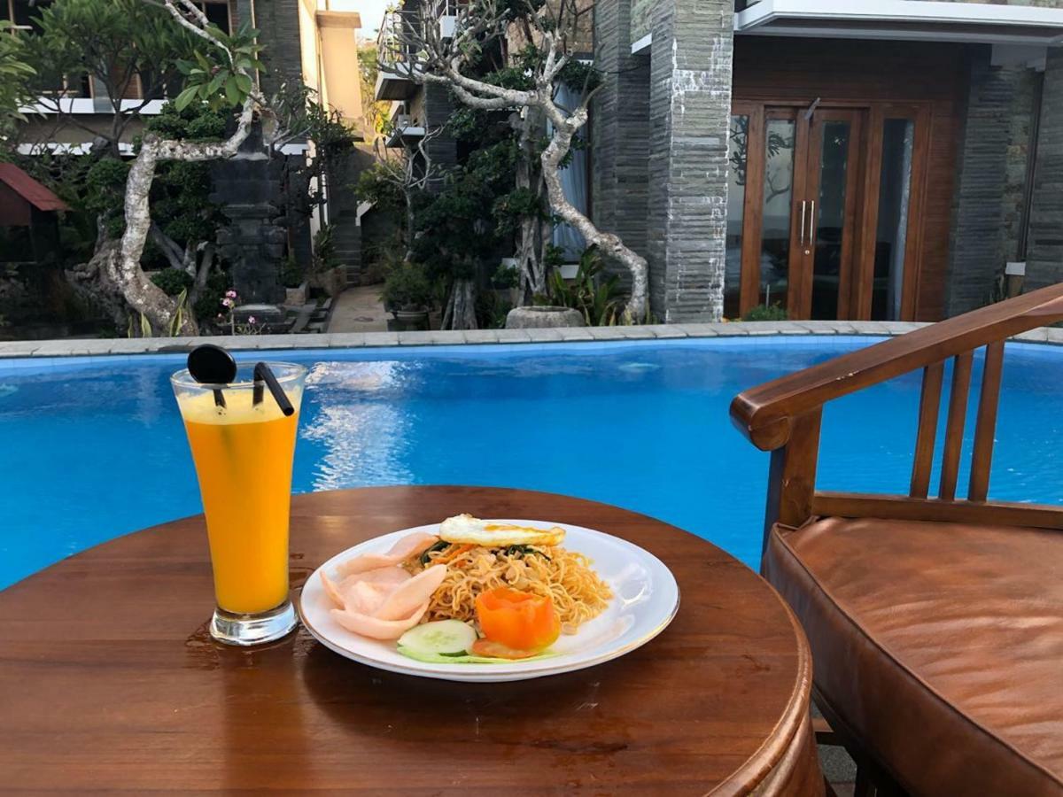 Green Beach Inn Batununggul Luaran gambar